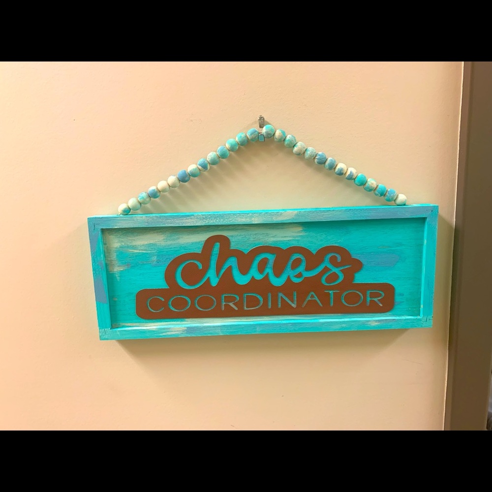 Chaos coordinator sign. Wooden sign with faux leather lettering.